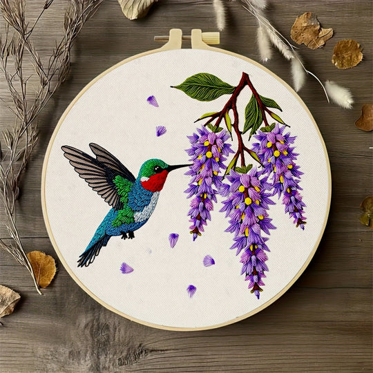 Hummingbird And Purple Flowers